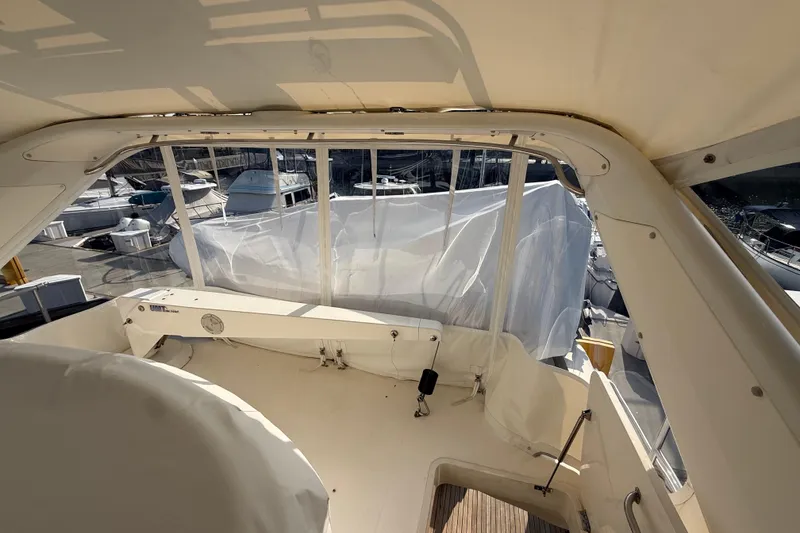 Slide: The Image of 1997 Viking Sport Cruisers 66 Motor Yacht interior view at marina. - 5