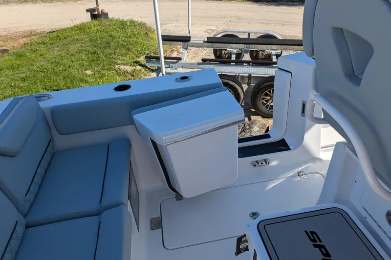 Slide: The Image of Interior view of 2026 Sportsman Heritage 261 Center Console boat with seating and storage. - 10