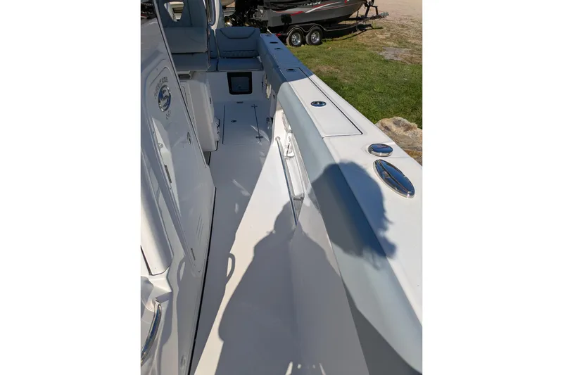 Slide: The Image of 2026 Sportsman Heritage 261 Center Console boat interior, featuring sleek design and modern amenities. - 17