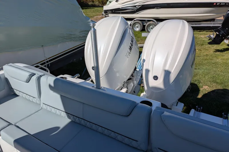 Slide: The Image of 2026 Sportsman Heritage 261 Center Console with twin Yamaha outboard engines. - 8