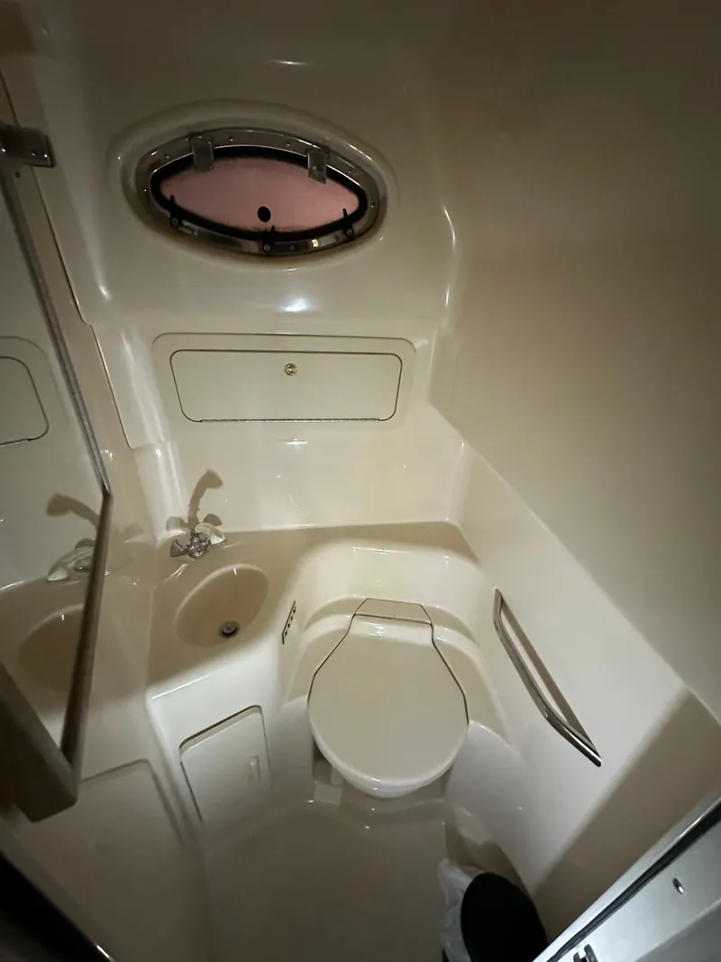 Slide: The Image of Interior view of the bathroom on a 1997 Sea Ray Sundancer 400 yacht. - 11