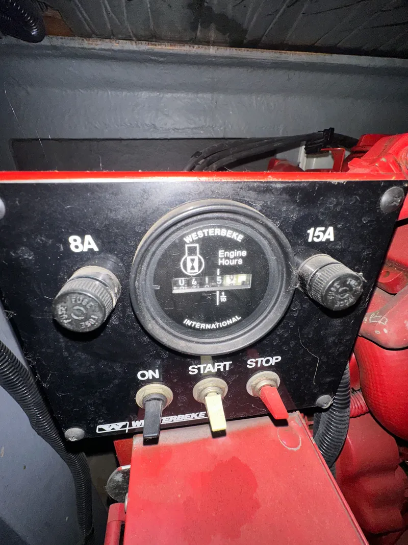 Slide: The Image of Westerbeke engine hour meter on 1997 Sea Ray Sundancer 400. - 18