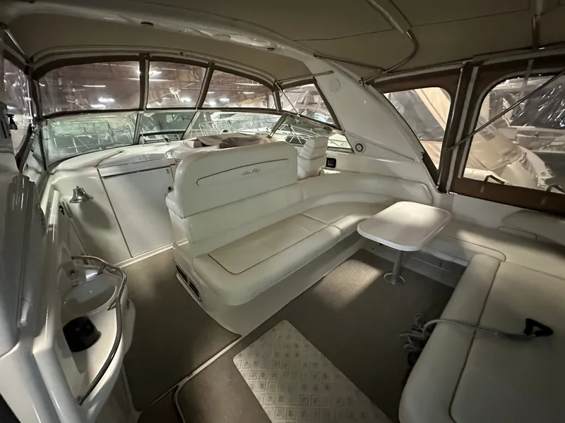 Slide: The Image of Interior of a 1997 Sea Ray Sundancer 400 yacht with white leather seating. - 3