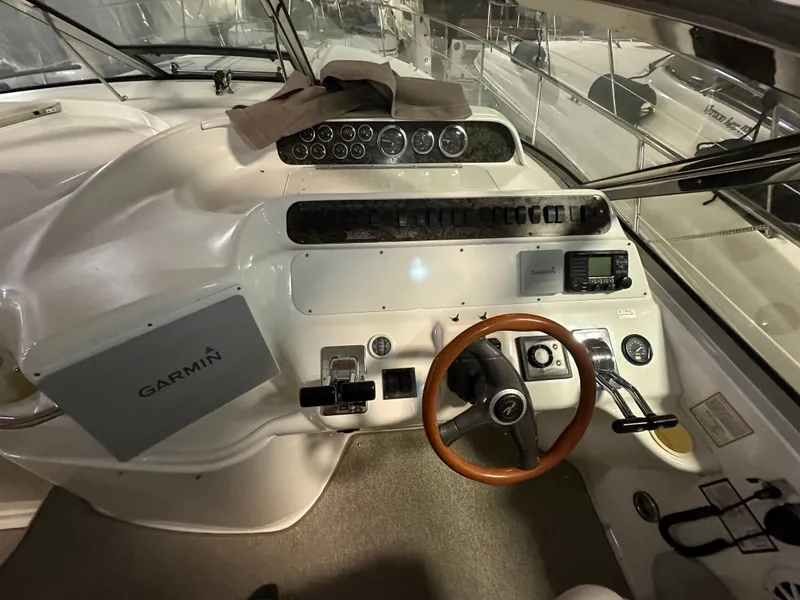 Slide: The Image of 1997 Sea Ray Sundancer 400 cockpit with Garmin navigation system. - 7
