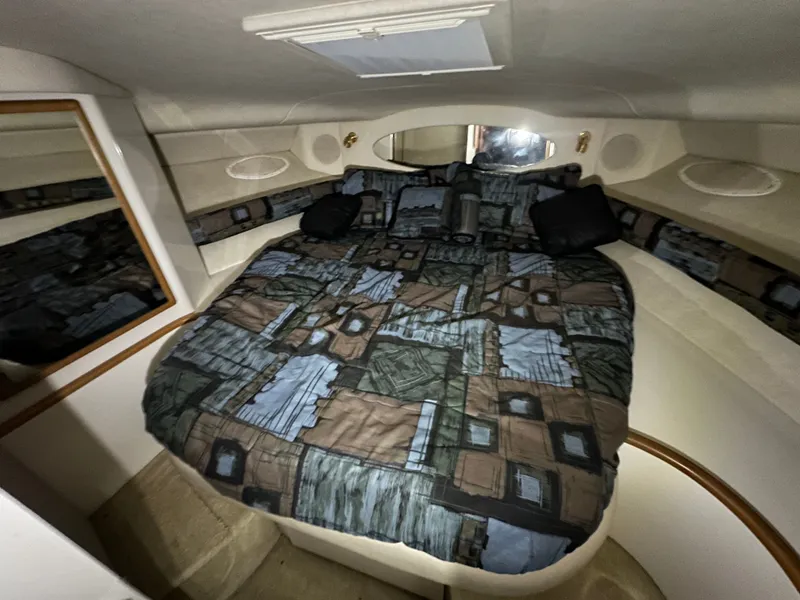 Slide: The Image of Interior of 1997 Sea Ray Sundancer 400 yacht with cozy bed. - 9