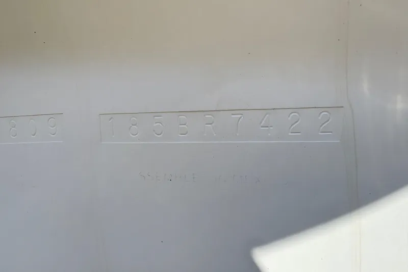 Slide: The Image of Hull identification number on 2009 Bayliner 185 Bowrider boat. - 12