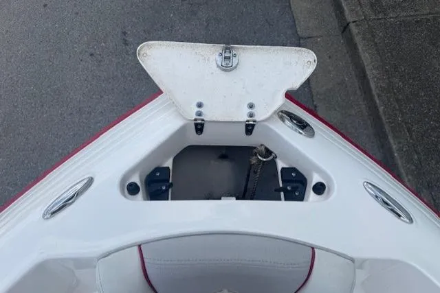 Slide: The Image of Bow of a 2011 Bryant 210 boat with anchor storage compartment. - 9