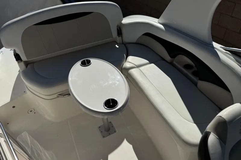 Slide: The Image of Interior of 2011 Chaparral 267 SSX boat with seating and table. - 21