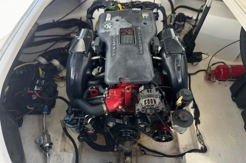 Slide: The Image of Engine compartment of a 2011 Chaparral 267 SSX boat featuring a Volvo Penta engine. - 23