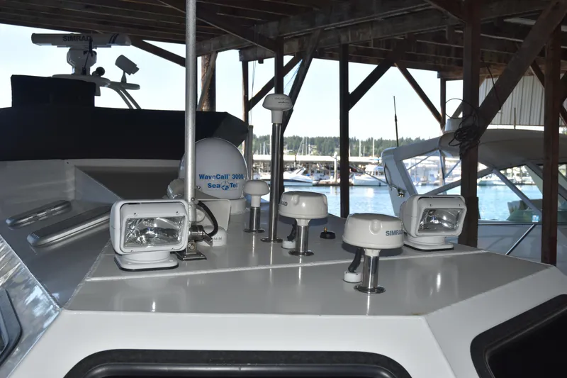 Slide: The Image of 2005 SAFE Boats 33 Full Cabin with navigation equipment in marina setting. - 10