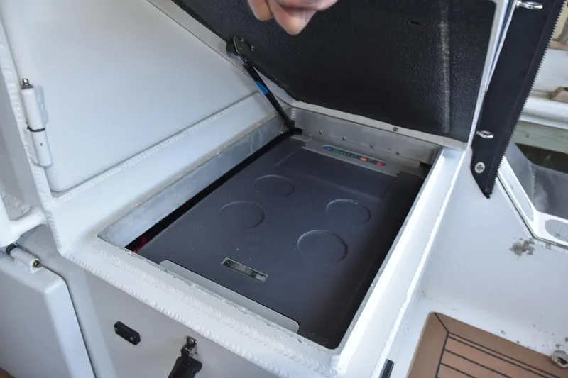Slide: The Image of Storage compartment in a 2005 SAFE Boats 33 Full Cabin, showcasing interior details. - 25