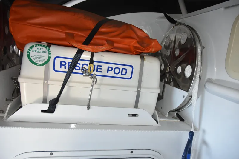 Slide: The Image of Rescue pod inside 2005 SAFE Boats 33 Full Cabin, equipped with safety gear. - 35