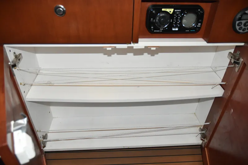 Slide: The Image of Interior cabinet of 2005 SAFE Boats 33 Full Cabin with stereo system. - 78