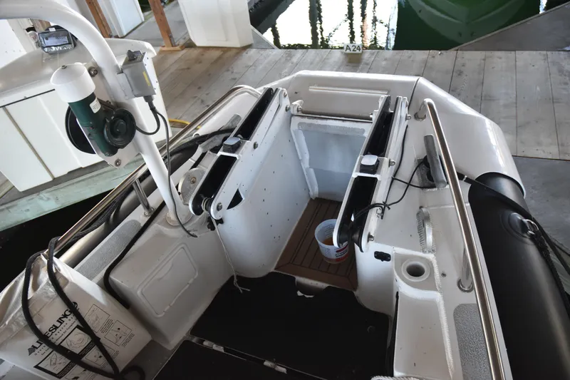 Slide: The Image of 2005 SAFE Boats 33 Full Cabin interior with equipment and dock view. - 9