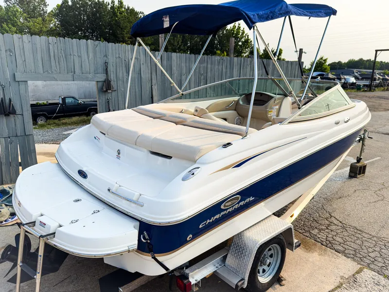 Slide: The Image of 2007 Chaparral 190 SSi boat with blue canopy on trailer. - 4