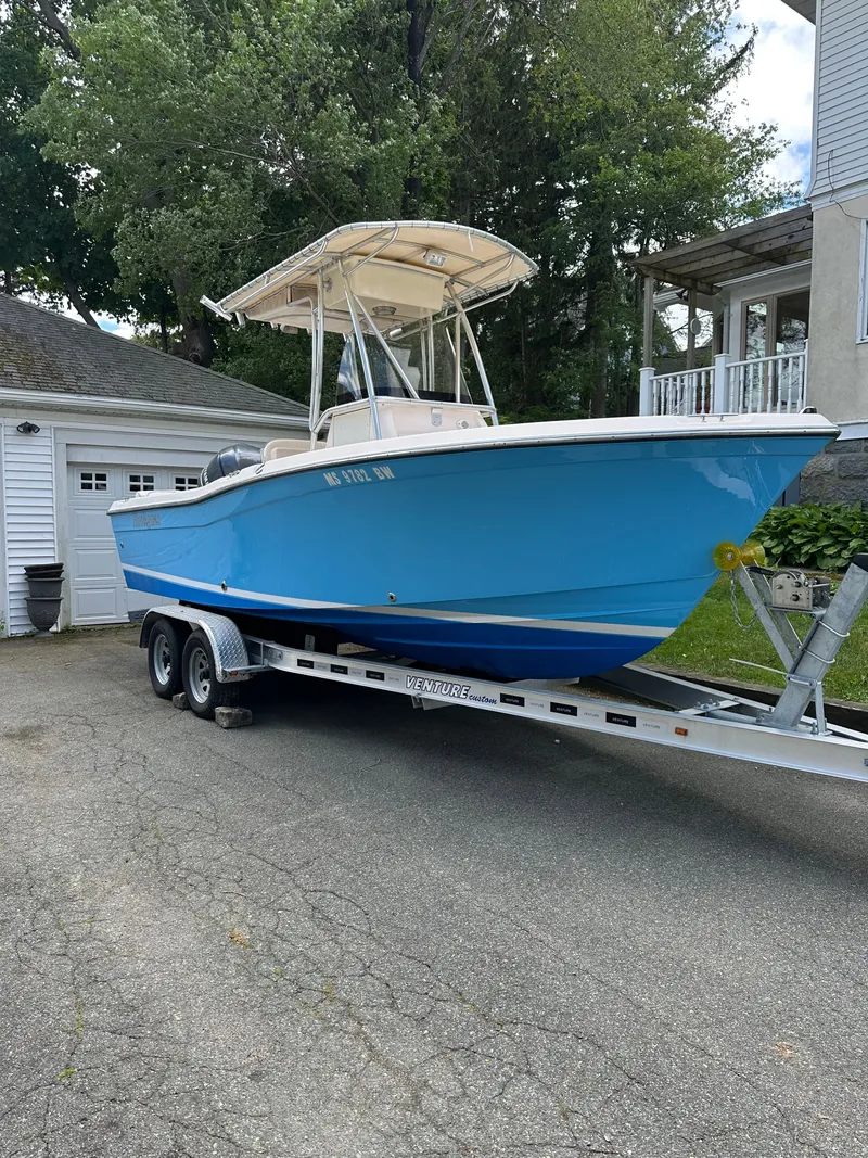 Slide: The Image of 2011 Grady-White Fisherman 209 boat on trailer outdoors. - 4