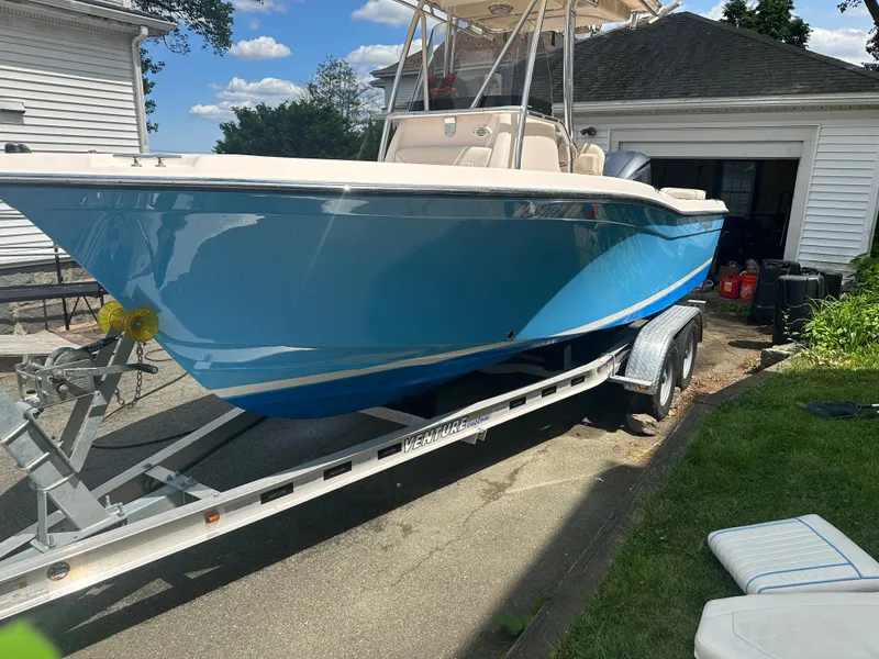 Slide: The Image of 2011 Grady-White Fisherman 209 boat on trailer in driveway. - 5