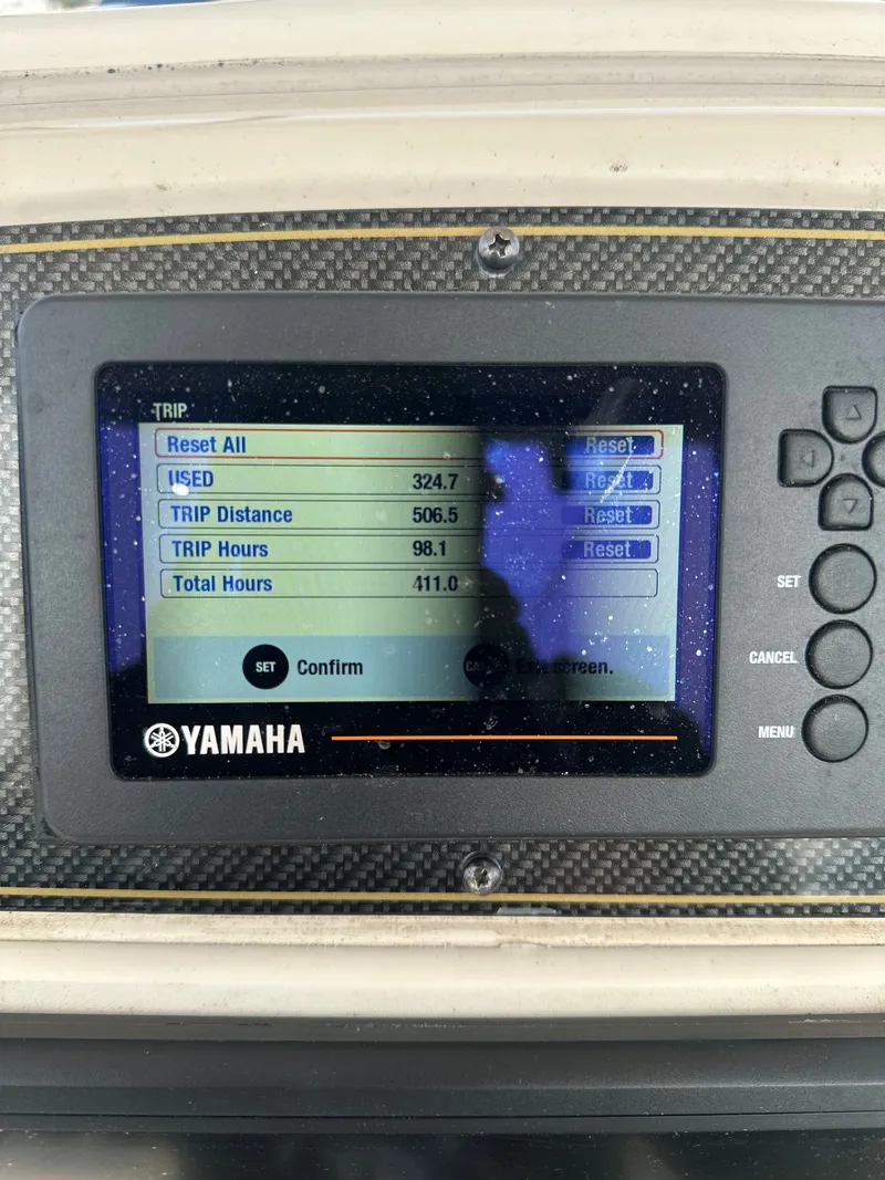 Slide: The Image of Yamaha display on Grady-White Fisherman 209 boat showing trip data. - 8