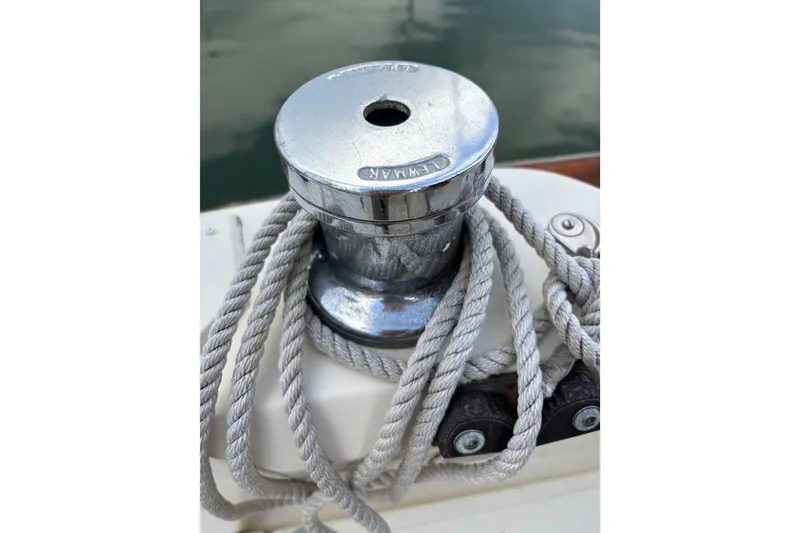 Slide: The Image of Winch with rope on 1970 King's Cruiser 28 sailboat deck. - 16
