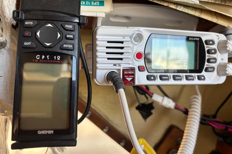Slide: The Image of Garmin GPS and Standard Horizon radio on a 1970 King's Cruiser 28 sailboat. - 20