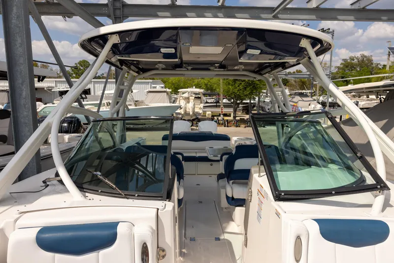 Slide: The Image of 2019 Robalo R317 Dual Console boat with spacious seating and modern design. - 17