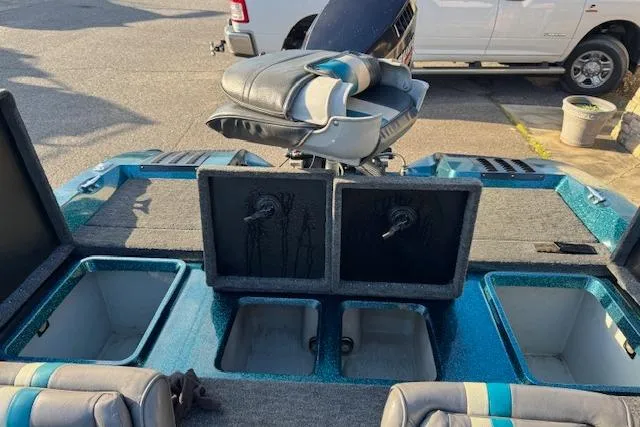 Slide: The Image of 1994 Javelin 389T boat interior with storage compartments and seating. - 16