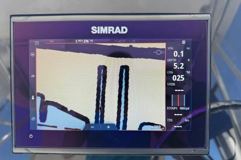 Slide: The Image of Simrad marine display on 2005 Century 3200 Walk-Around showing navigation data. - 34