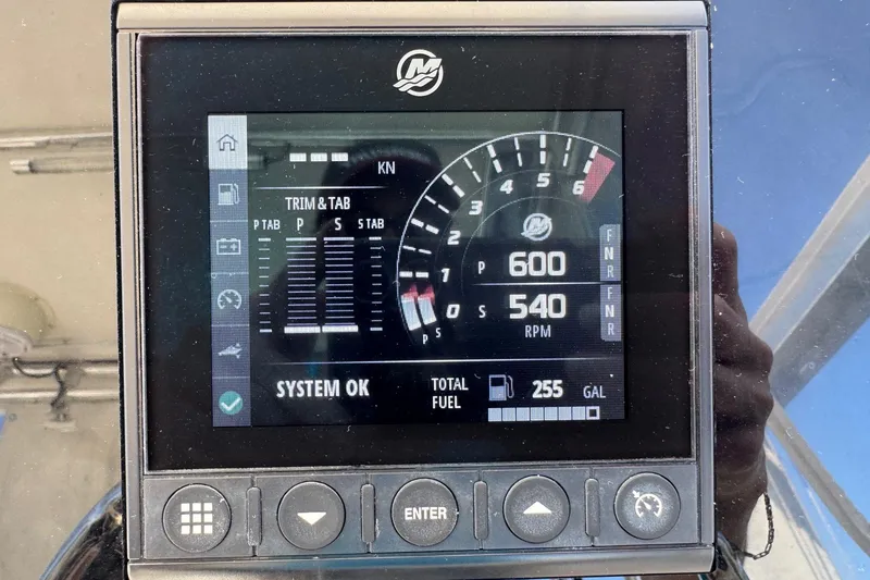 Slide: The Image of Digital display on a 2005 Century 3200 Walk-Around boat showing engine RPM and fuel level. - 43
