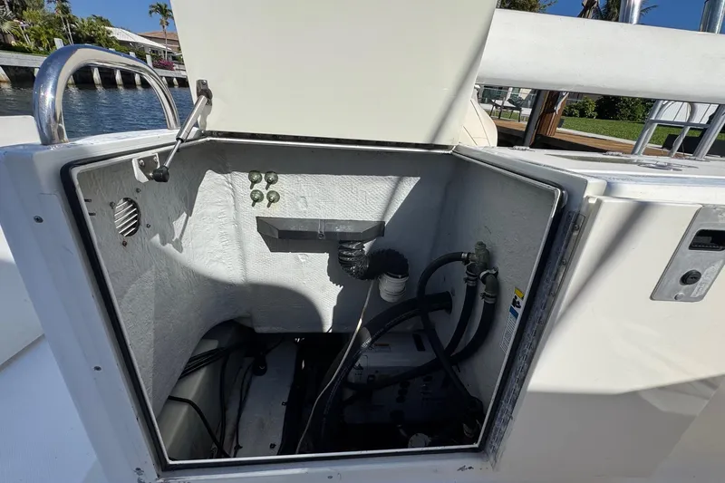 Slide: The Image of Open compartment of a 2005 Century 3200 Walk-Around boat, showing internal components. - 50