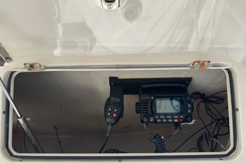 Slide: The Image of Boat radio equipment inside a 2005 Century 3200 Walk-Around compartment. - 68