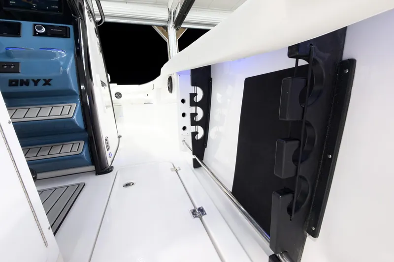 Slide: The Image of 2026 Tidewater 272 CC Adventure boat interior with sleek design and modern features. - 34