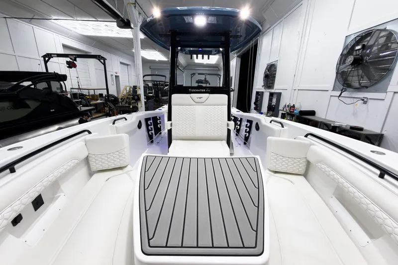 Slide: The Image of 2026 Tidewater 272 CC Adventure boat interior with modern seating and sleek design. - 46