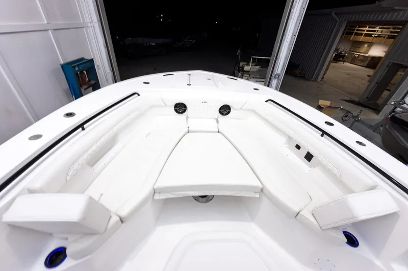 Slide: The Image of 2026 Tidewater 272 CC Adventure boat interior with white seating and modern design. - 51