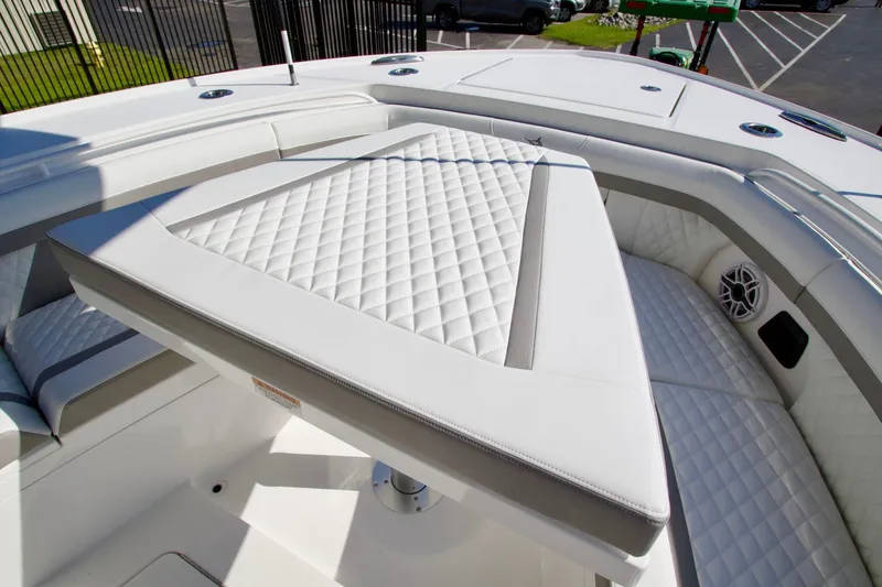 Slide: The Image of Luxurious seating area on 2027 Regulator 35 boat with quilted upholstery. - 18
