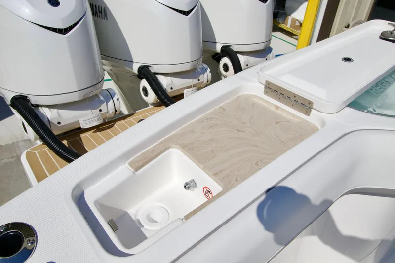 Slide: The Image of 2027 Regulator 35 boat with Yamaha engines and onboard sink. - 41