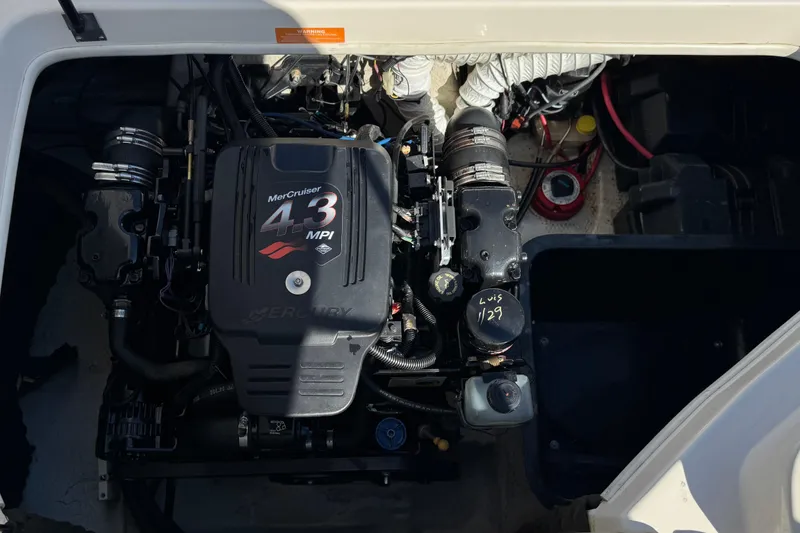Slide: The Image of Engine compartment of a 2003 Rinker 192 Captiva Bowrider with MerCruiser 4.3 MPI engine. - 16