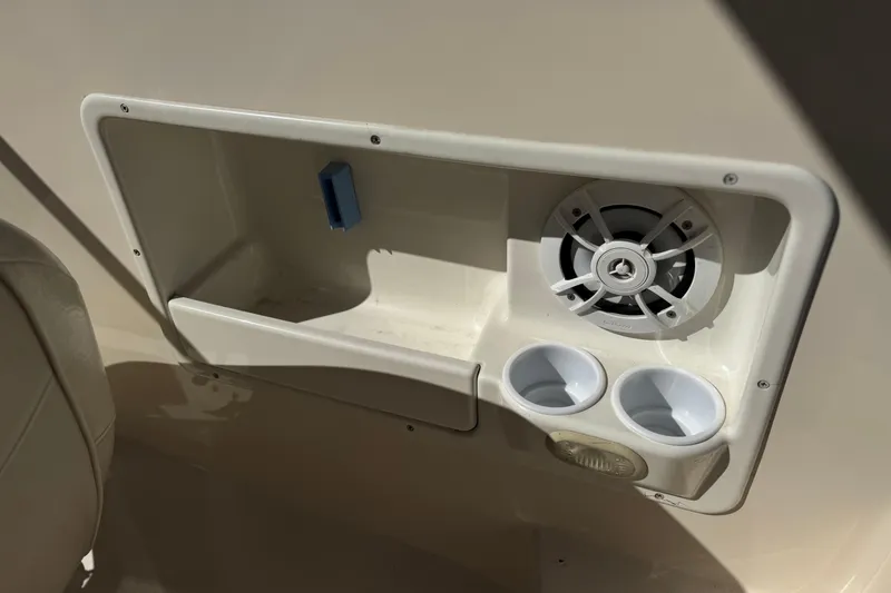 Slide: The Image of Interior of 2003 Rinker 192 Captiva Bowrider with speaker and cup holders. - 24