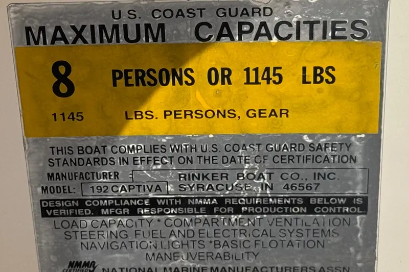 Slide: The Image of 2003 Rinker 192 Captiva Bowrider capacity label, 8 persons or 1145 lbs limit. - 27