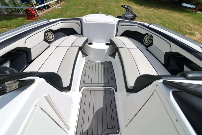 Slide: The Image of 2017 Yamaha Boats 212X interior with sleek seating and modern design. - 10