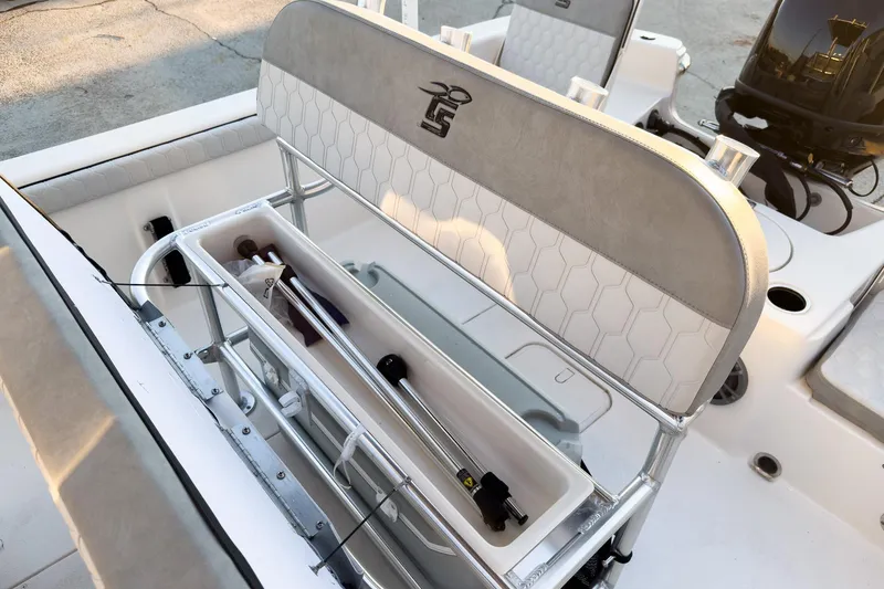 Slide: The Image of 2026 Carolina Skiff 19 LS boat interior with seating and storage compartments. - 20