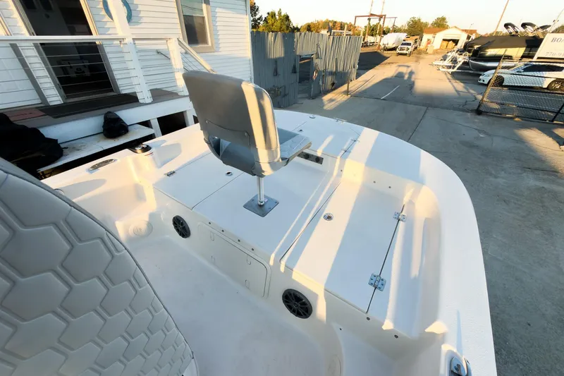 Slide: The Image of 2026 Carolina Skiff 19 LS boat interior with seating and storage compartments. - 30