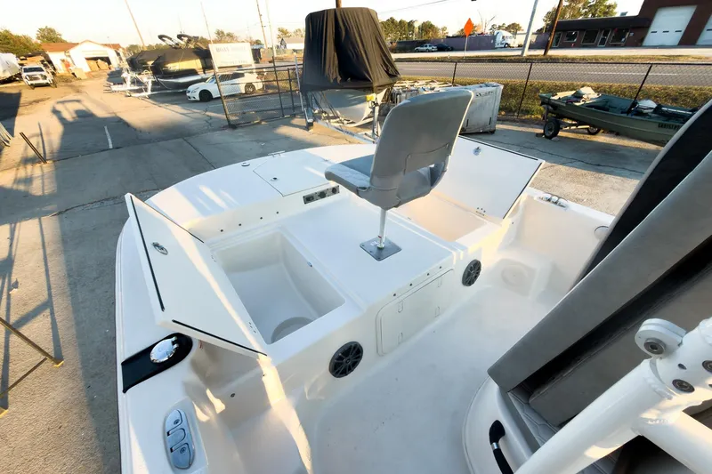 Slide: The Image of 2026 Carolina Skiff 19 LS boat interior with seating and storage compartments. - 31