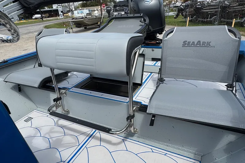 Slide: The Image of 2026 SeaArk Shadow 187T boat interior with seating and storage compartments. - 13