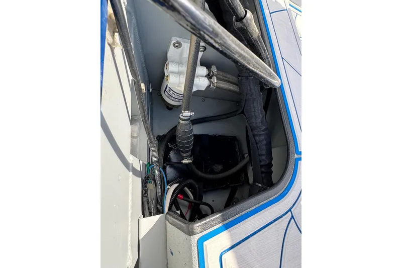 Slide: The Image of Interior view of 2026 SeaArk Shadow 187T boat showing mechanical components and wiring. - 17