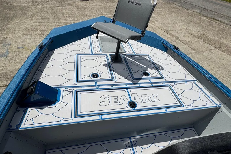 Slide: The Image of 2026 SeaArk Shadow 187T boat deck with custom seating and stylish design. - 6
