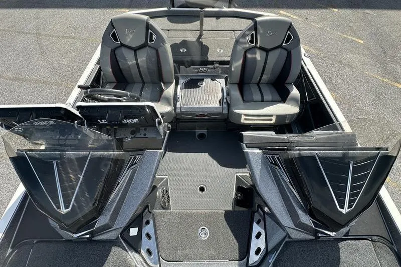 Slide: The Image of 2023 Ranger Z520R boat interior with dual seats and modern dashboard design. - 12