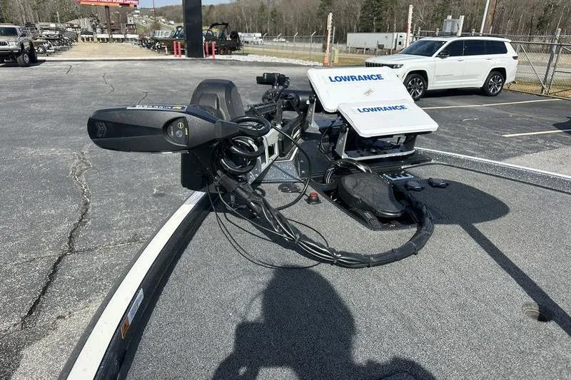 Slide: The Image of 2023 Ranger Z520R boat with Lowrance electronics on a parking lot. - 4