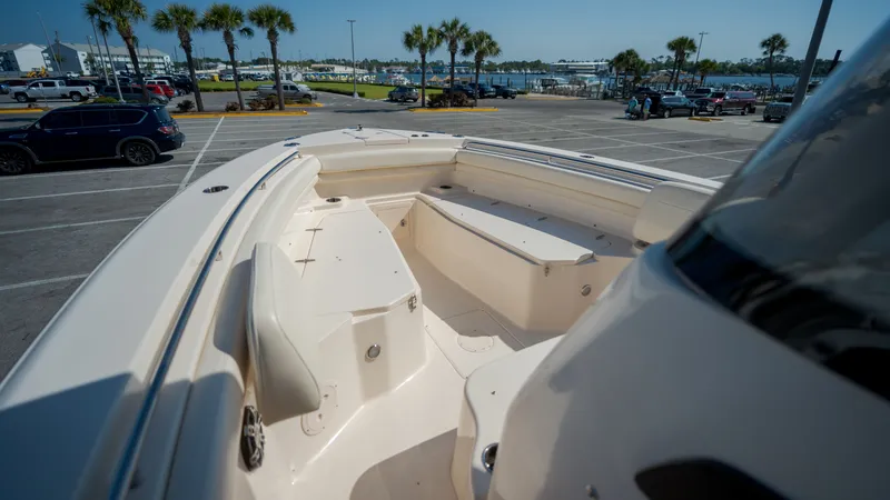Slide: The Image of Grady-White Canyon 306 boat, 2019 model, in a sunny parking lot. - 11