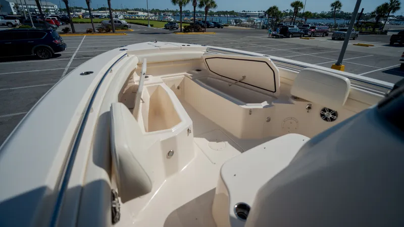 Slide: The Image of Interior view of a 2019 Grady-White Canyon 306 boat at the marina. - 12
