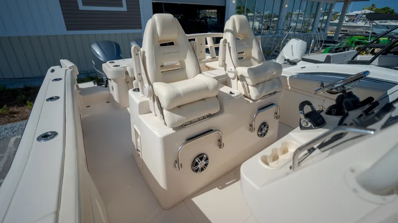 Slide: The Image of Interior of a 2019 Grady-White Canyon 306 boat with luxurious seating. - 16